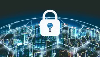 Cybersecurity concept showing a digital lock icon over a connected smart city skyline, representing secure IoT networks and data protection.
